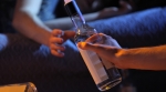 Alcohol passing hands Alcohol passing hands
