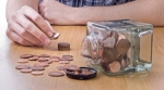 Boy counting pennies Boy counting pennies