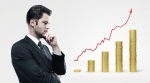 Businessman increasing bar graph Businessman increasing bar graph
