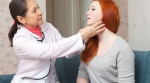 Doctor examining young patient Doctor examining young patient
