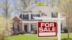 House with for sale sign House with for sale sign