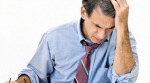 Man reviewing documents Man reviewing documents
