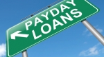 Payday loan sign against sky Payday loan sign against sky
