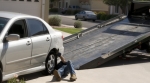 Repo man repossessing a vehicle Repo man repossessing a vehicle