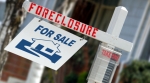 foreclosure sign outside a home foreclosure sign outside a home