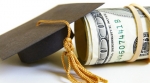 Graduation cap and money roll Graduation cap and money roll
