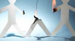 Paper person burnt by fire Paper person burnt by fire