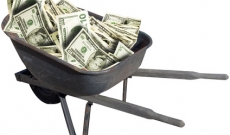 cash money in a wheelbarrow cash money in a wheelbarrow