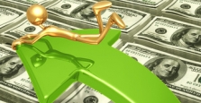 Man riding a forward arrow above stacks of cash