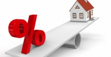 House and percent sign on seesaw