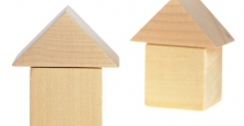 Two houses made of wooden blocks