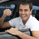 Man with new car financed with an auto loan