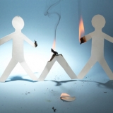 Paper person burnt by fire Paper person burnt by fire