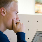 Man considering borrowing a loan