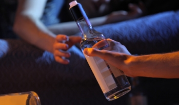 Alcohol passing hands Alcohol passing hands