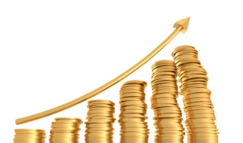 Upwards graph made of coins Upwards graph made of gold coin columns