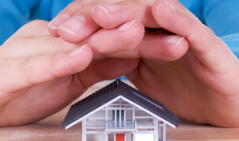 Hands over small house Hands over small house