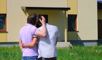 Same sex couple viewing home Same sex couple viewing home