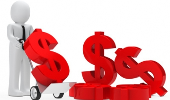 Man moving dollar signs into a stack Man moving dollar signs into a stack