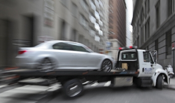 Car getting towed Car getting towed
