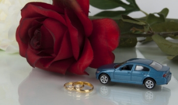 Car, rose, and wedding rings Car, rose, and wedding rings