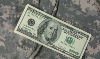 hundred dollar bill on uniform hundred dollar bill on uniform