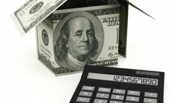 hundred dollar bill house and calculator hundred dollar bill house and calculator