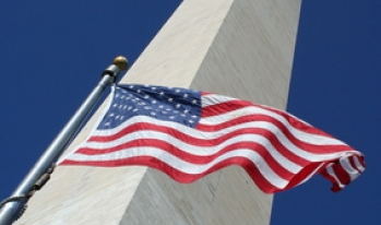 American flag under Washington monument American flag under Washington monument