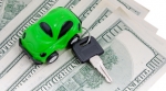 car and keys on top of money car and keys on top of money