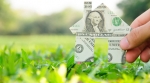 dollar bill house on grass dollar bill house on grass