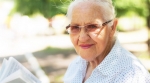 an elderly woman with glasses an elderly woman with glasses