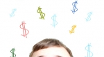 Man looking at different dollar signs Man looking at different dollar signs