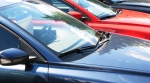 row of cars at a dealership lot row of cars at a dealership lot