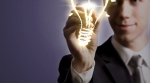 Smart man drawing picture of light bulb Smart man drawing picture of light bulb