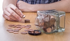 Boy counting pennies Boy counting pennies