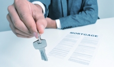mortgage loan hand with keys mortgage loan hand with keys