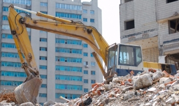 Bulldozer and destroyed offices Bulldozer and destroyed offices