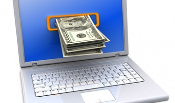 Money coming out of computer screen Money coming out of computer screen