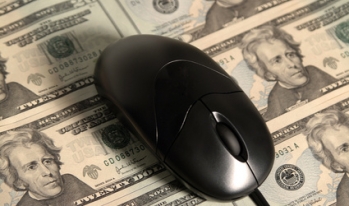 Computer mouse on money Computer mouse on money