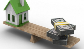House and money on a seesaw House and money on a seesaw