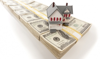 House on stacked money House on stacked money