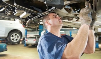 Mechanic fixing car Mechanic fixing car