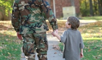 Military Father and Son Approaching House Military Father and Son Approaching House