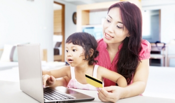 Mother and daughter shopping online Mother and daughter shopping online