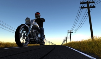 Motorcycle rider on open road Motorcycle rider on open road
