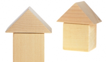 Two houses made of wooden blocks Two houses made of wooden blocks