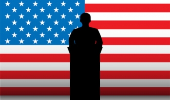 President at podium in front of American flag President at podium in front of American flag