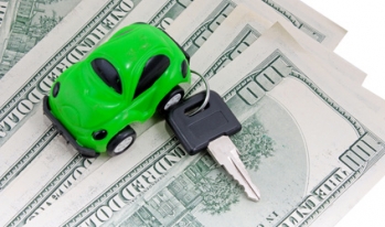 car and keys on top of money car and keys on top of money