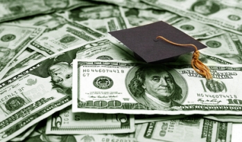 graduation cap on money graduation cap on money