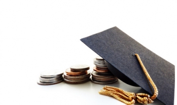 coins and change under a graduation cap coins and change under a graduation cap